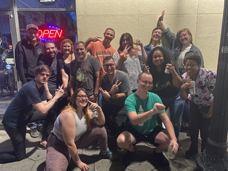 A group photo of the diverse Killer Queen Jacksonville community